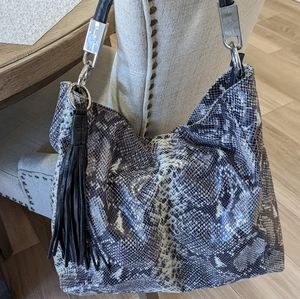 Snakeskin embossed Italian leather shoulder bag.